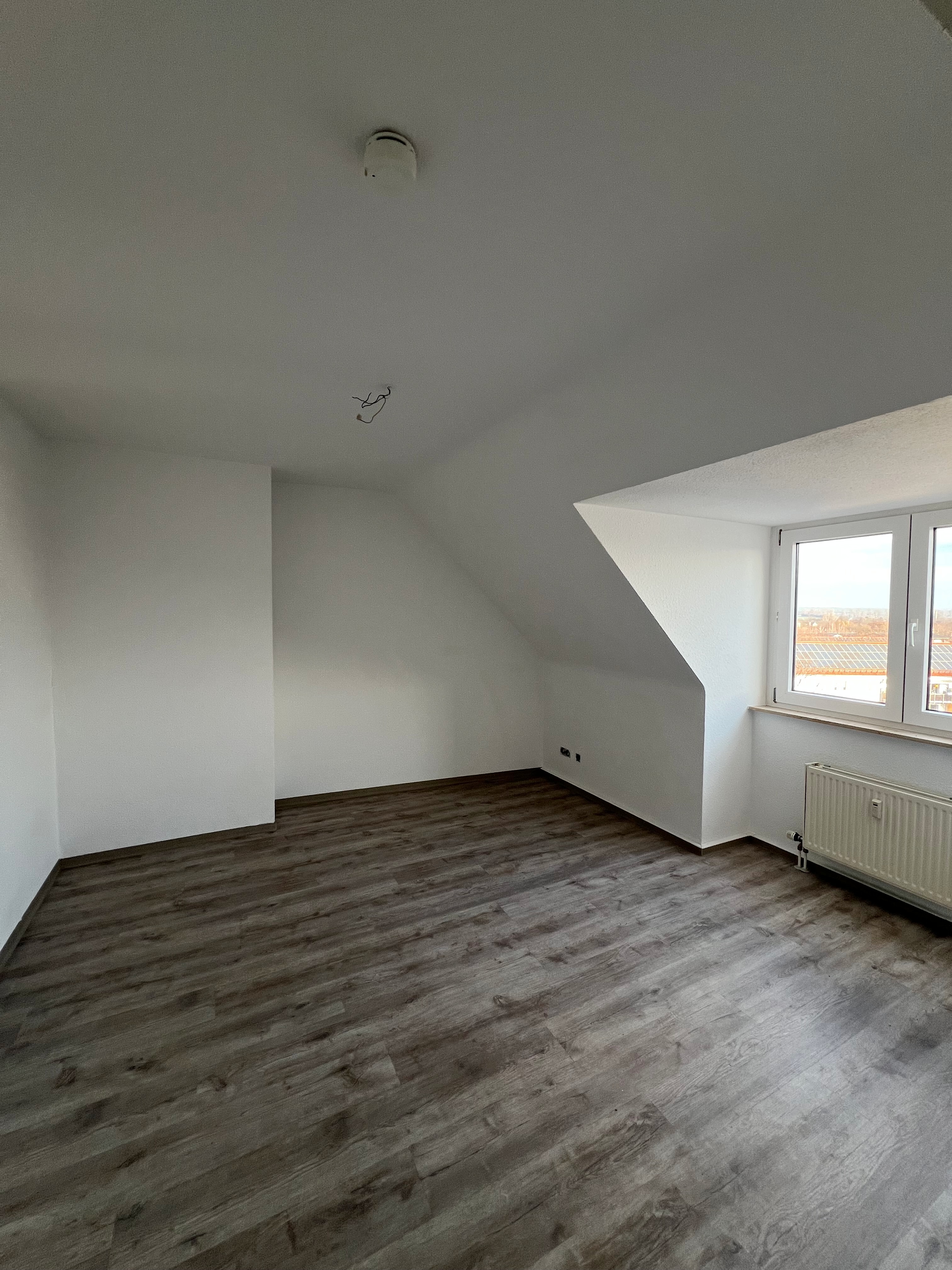 diese-grosszuegige-dachgeschosswohnung-mit-loft-charakter-befindet.jpeg